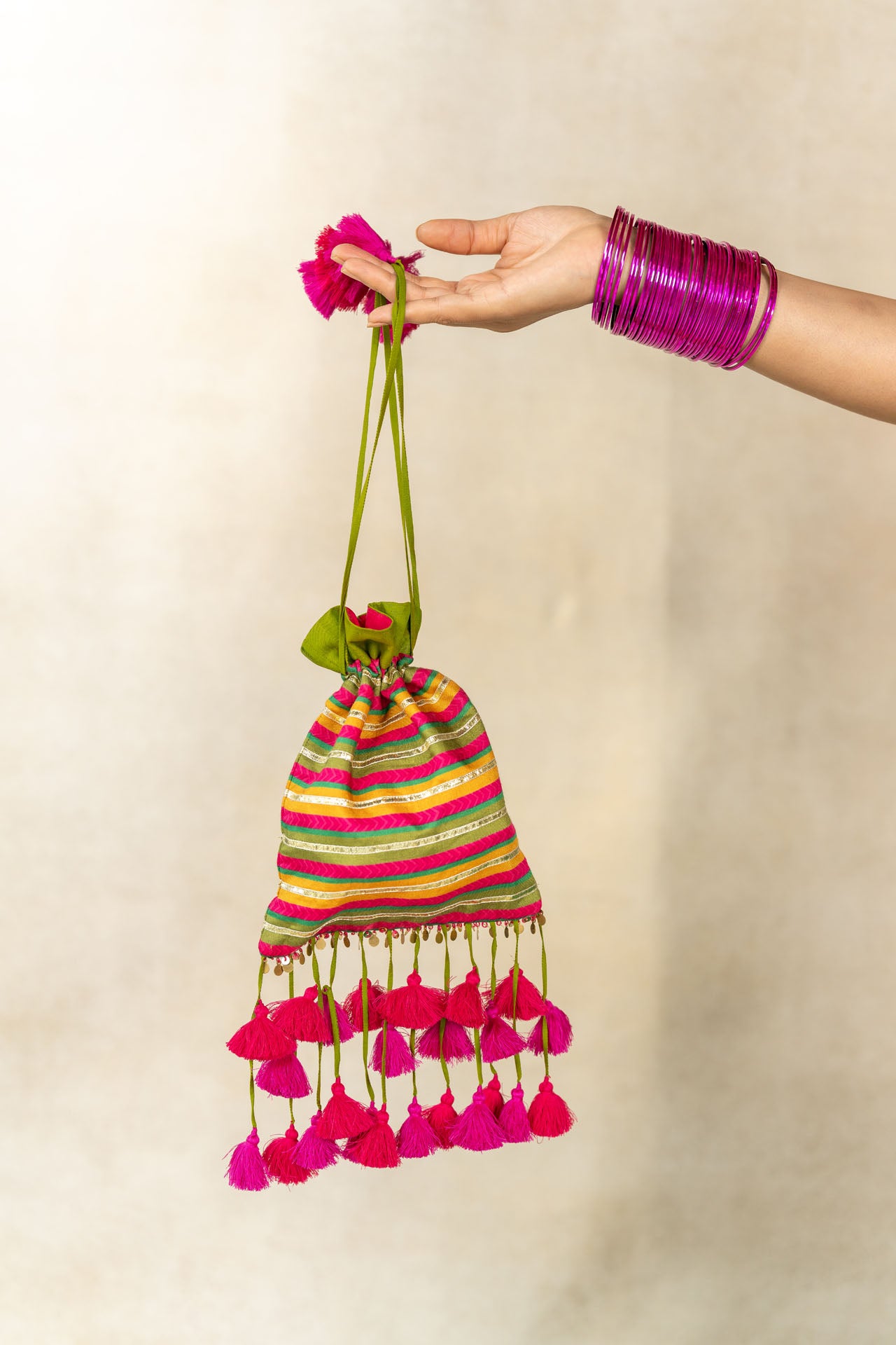 Mustard-mehendi green striped printed potli bag