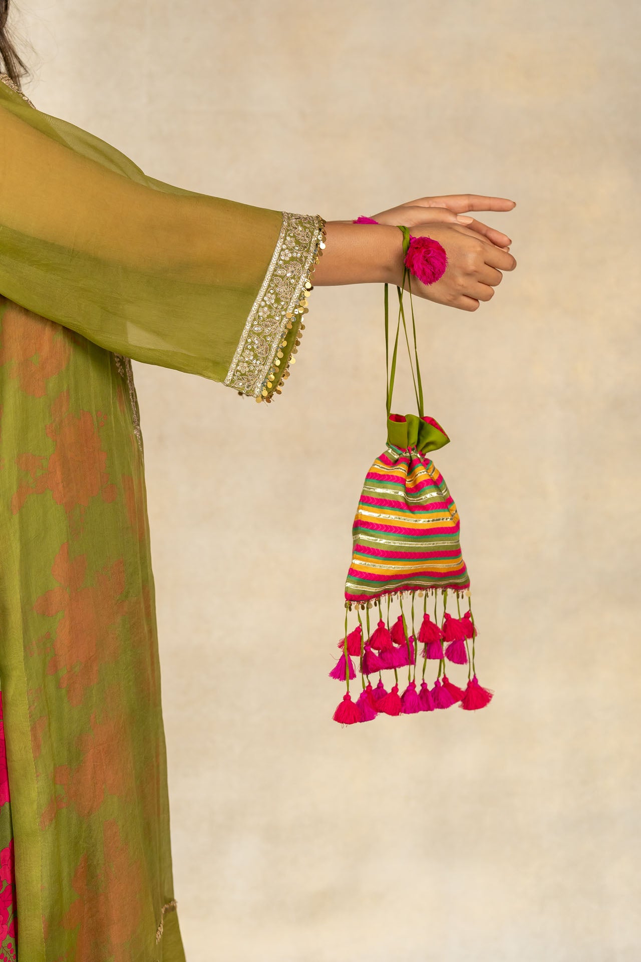 Mustard-mehendi green striped printed potli bag
