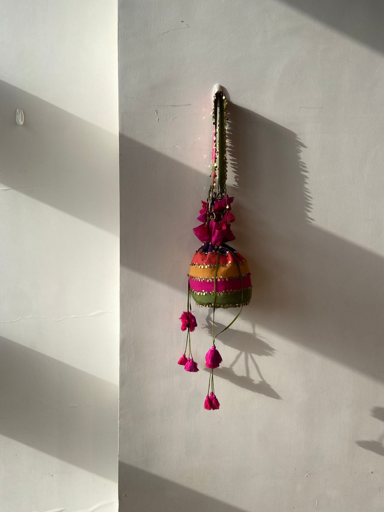 Multicolor patchwork coin-sequins-tassel detailed hand embroidered bucket bag