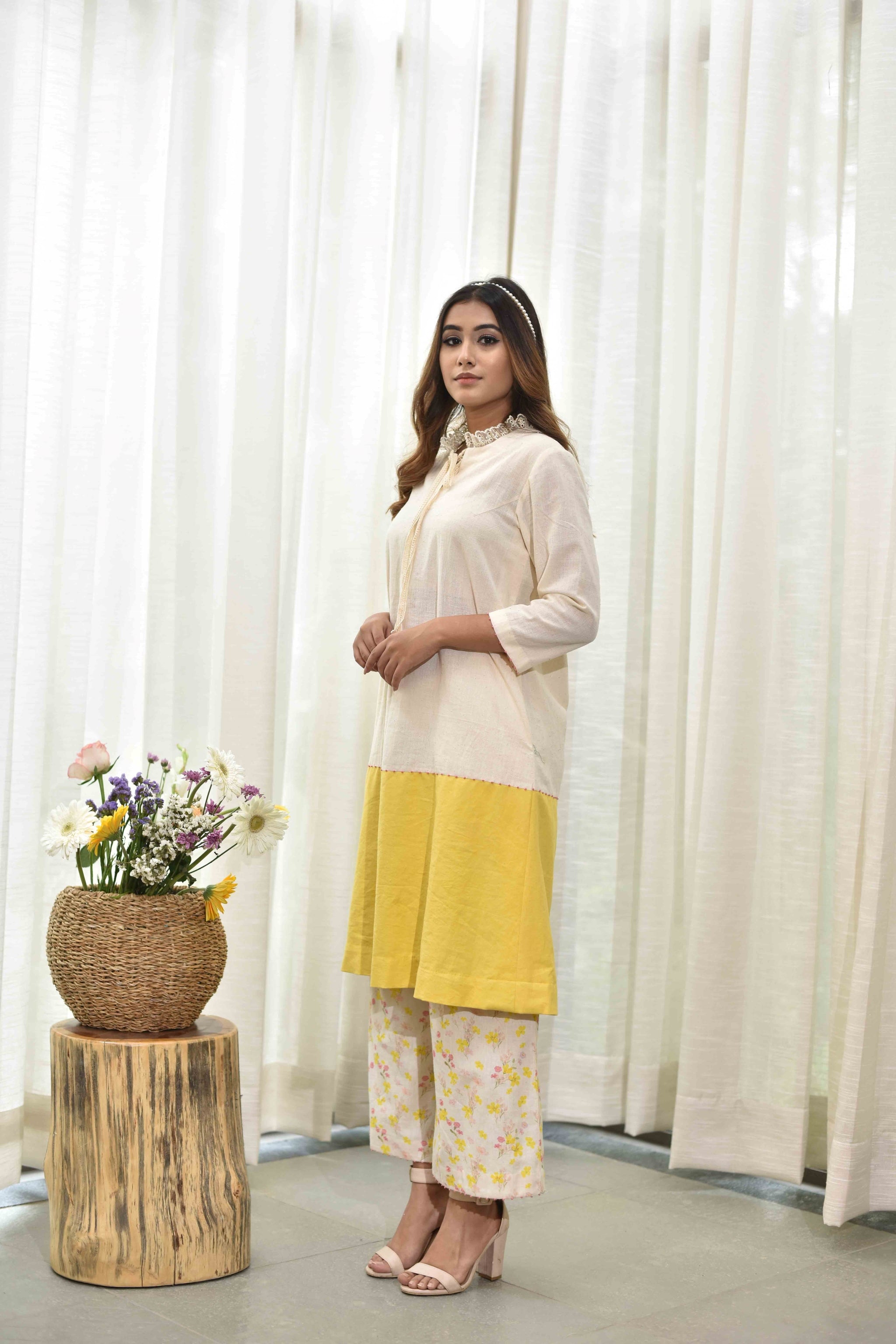 Off-white And Yellow Top With Floral Pants