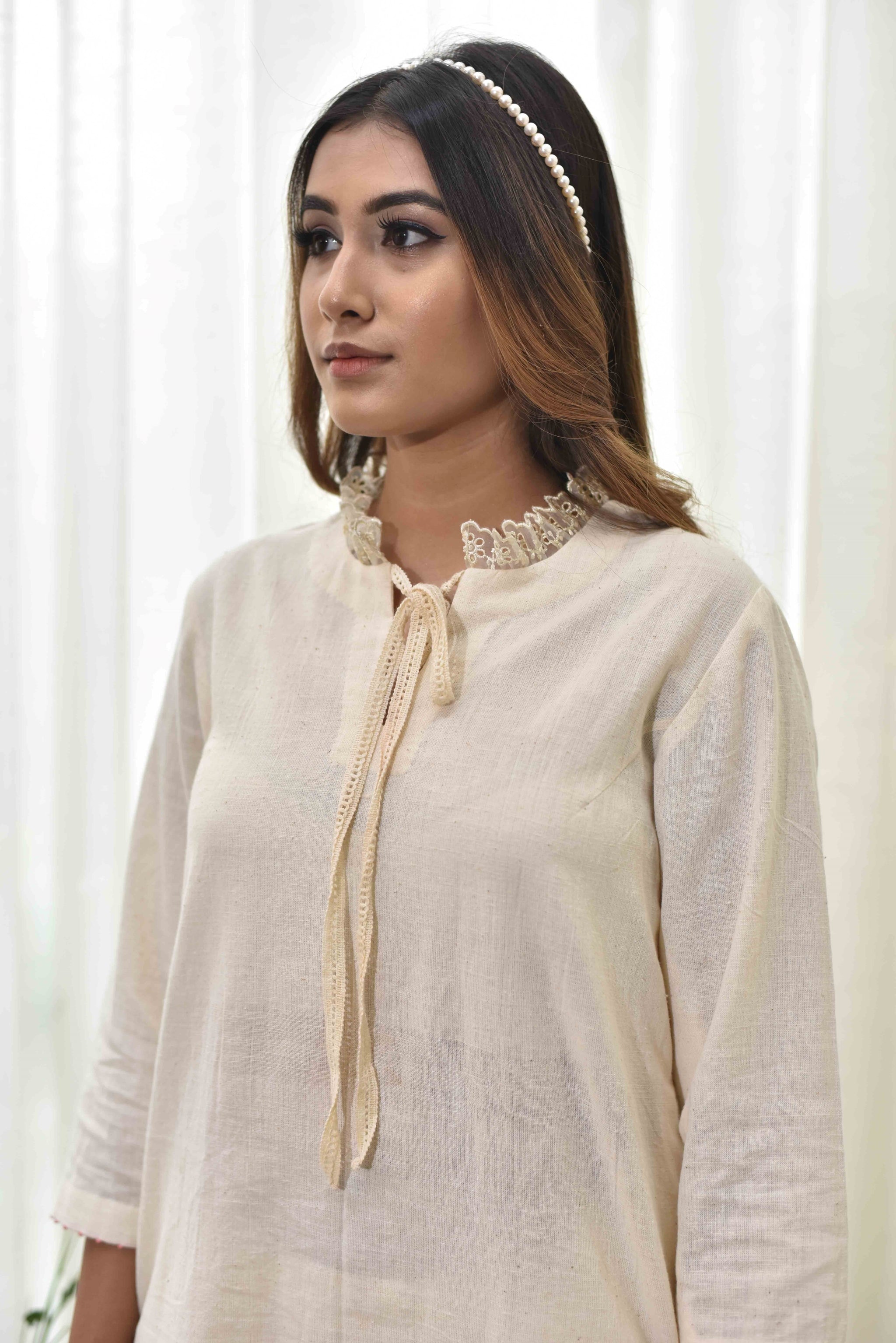 Off-white And Yellow Top With Floral Pants