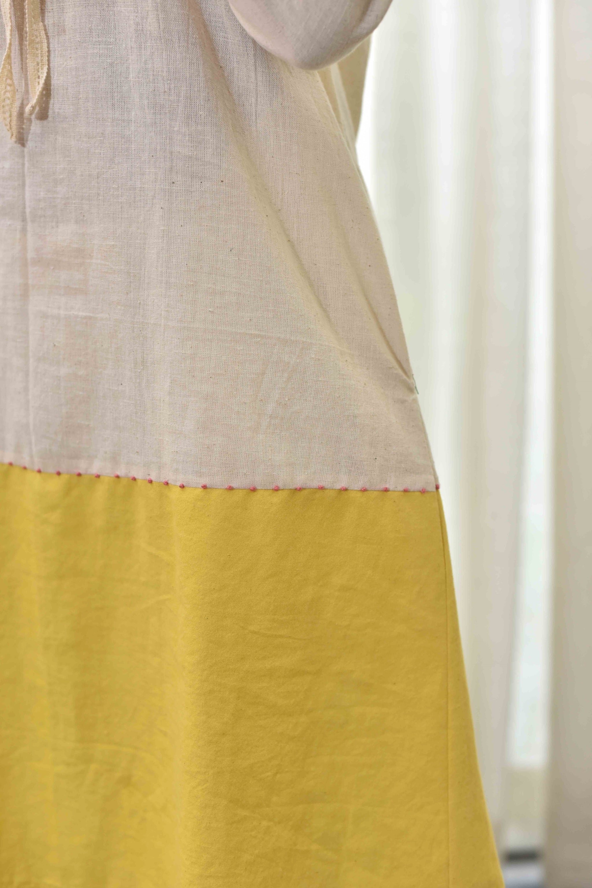 Off-white And Yellow Top With Floral Pants